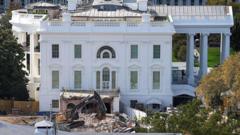 Judge temporarily halts construction of Trump’s White House ballroom