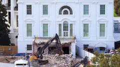 Judge halts above-ground construction of Trump’s White House ballroom