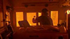 Canada wildfires leave train ‘encased in flames’ as smoke drifts towards US
