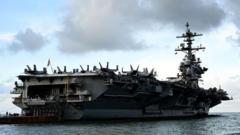 US aircraft carrier on way to relieve USS Lincoln after issues reported aboard