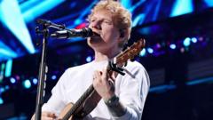 Stadium owner Robert Kraft says Ed Sheeran asked him to donate $2m in aid after Macklemore backlash